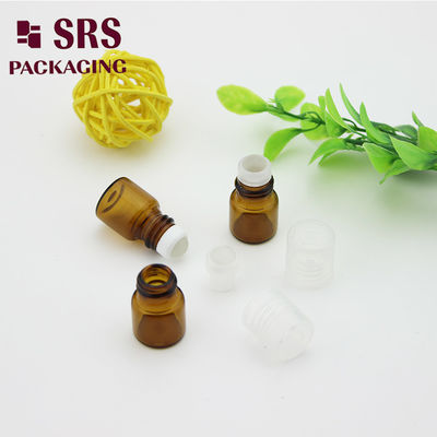 SRS খালি 1ml অ্যাম্বার গ্লাস রোল পারফিউম বোতল সঙ্গে স্বচ্ছ প্লাস্টিকের ঢাকনা
